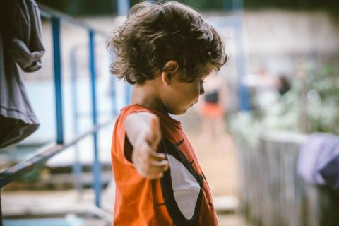 child in yoga pose