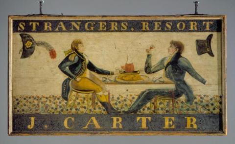 colonial history sign reading "strangers, resort J. Carter" depicting two men in overcoats sitting at a table and drinking having thrown off their hats