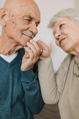 a senior couple gazes at each other